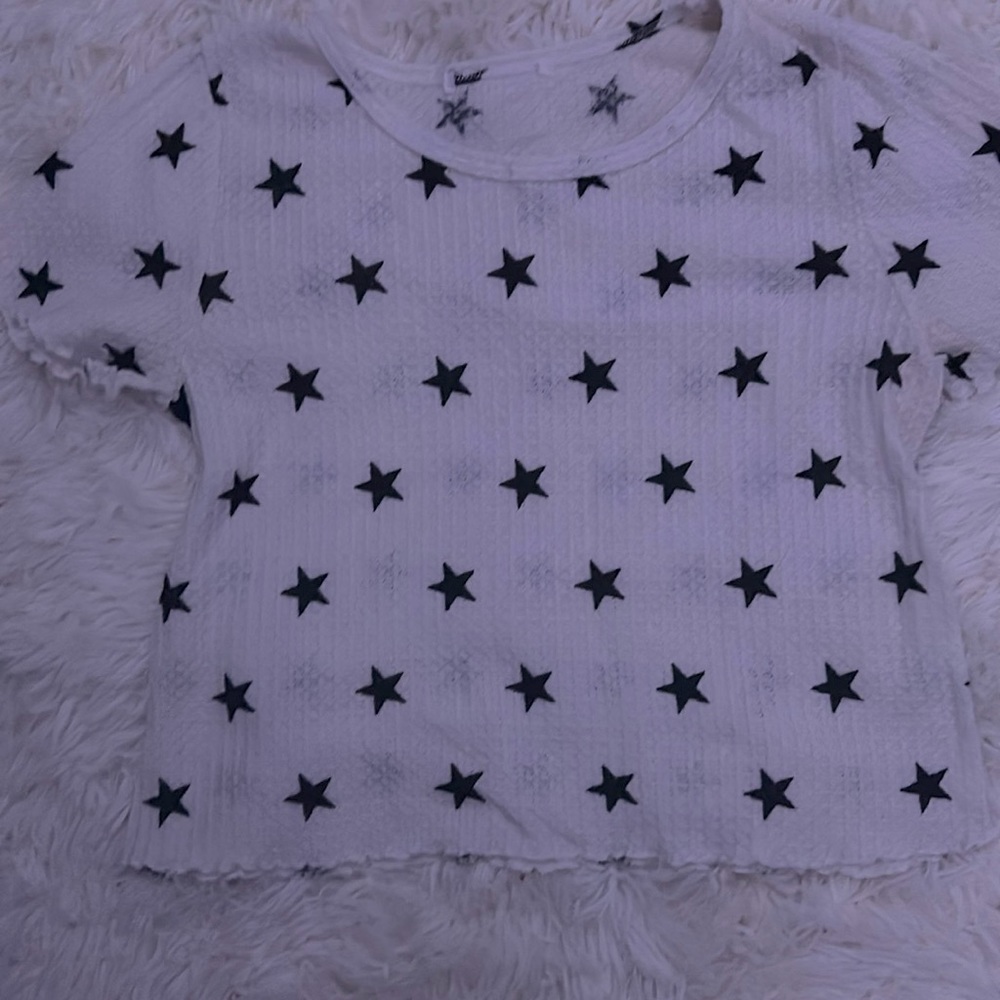 it looks really cute with a white tank top under it